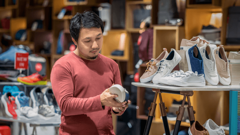 Man shopping for sneakers.