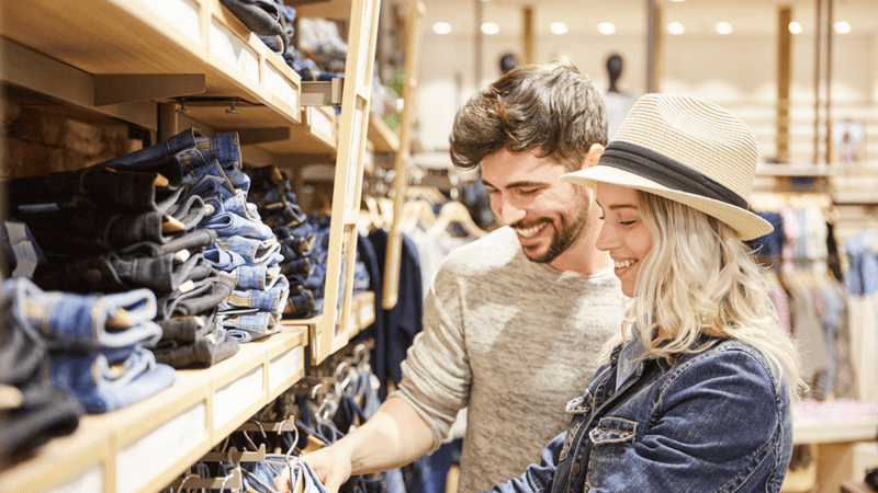 Couple shopping for clothing.