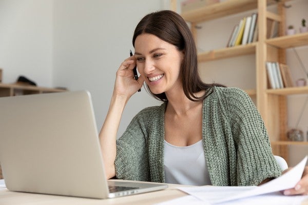 Woman looking at her laptop computer screen. Woman looking at her laptop computer screen.